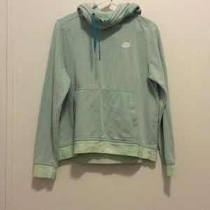 Light blue sweatshirt.